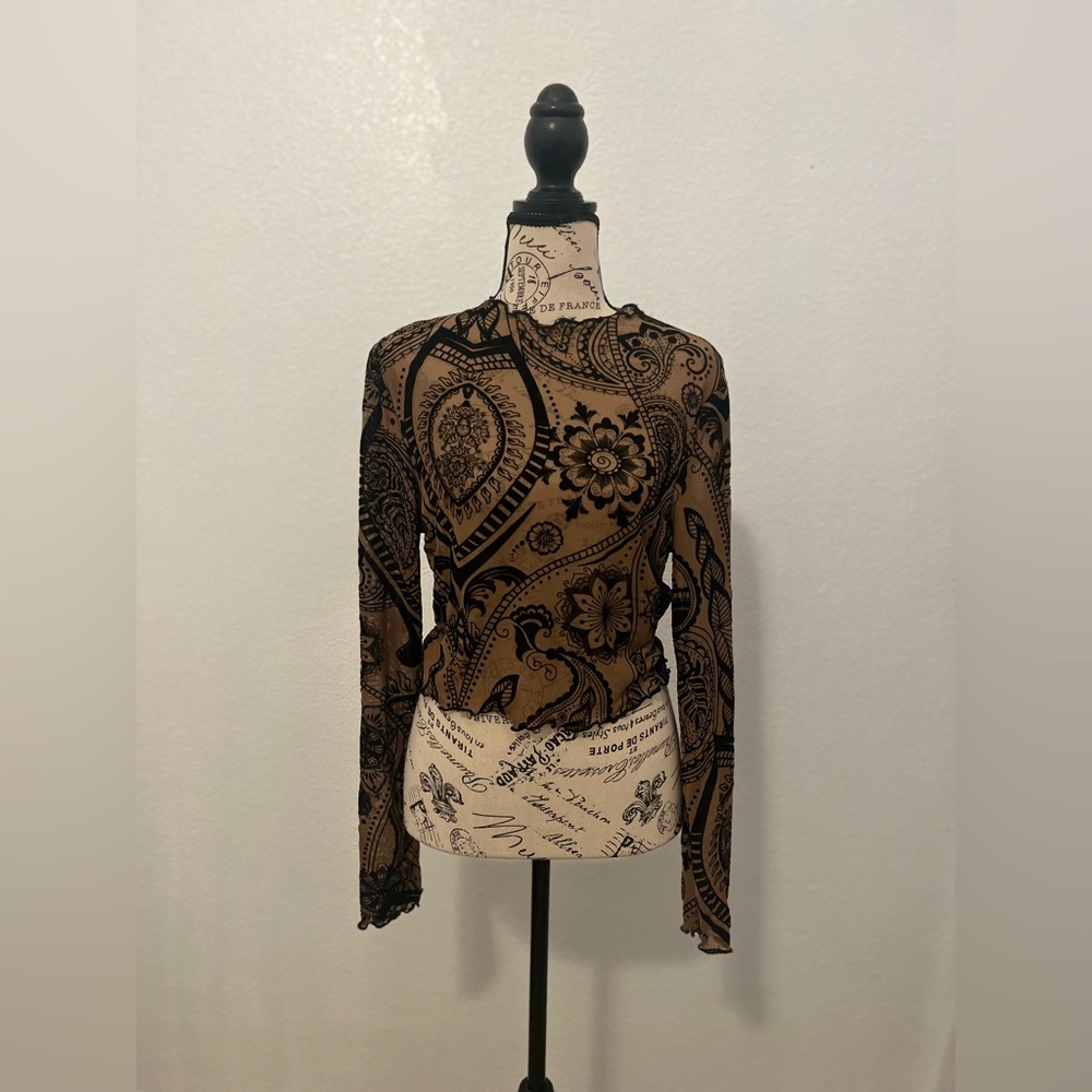 Beautiful floral mesh top.